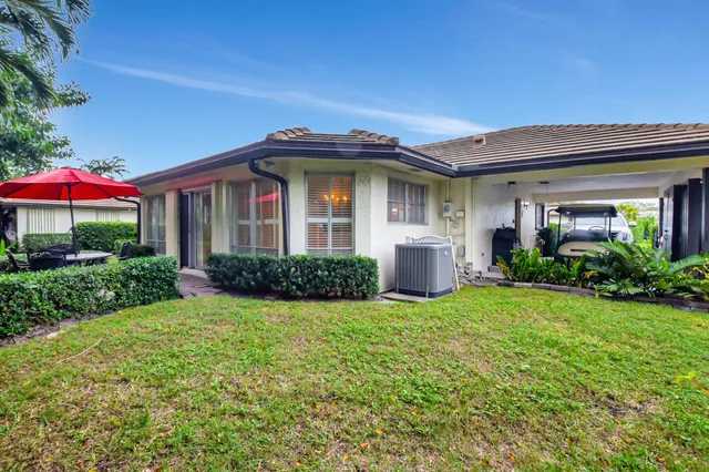 $450,000 | 428 Pine Villa Drive, Atlantis, FL 33462