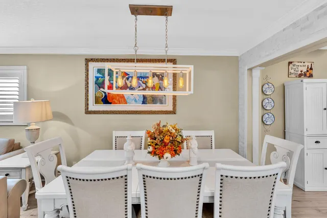 a bathroom with a granite countertop sink and a shower