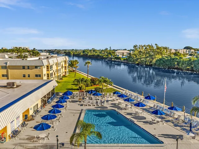 a view of swimming pool from a balcony