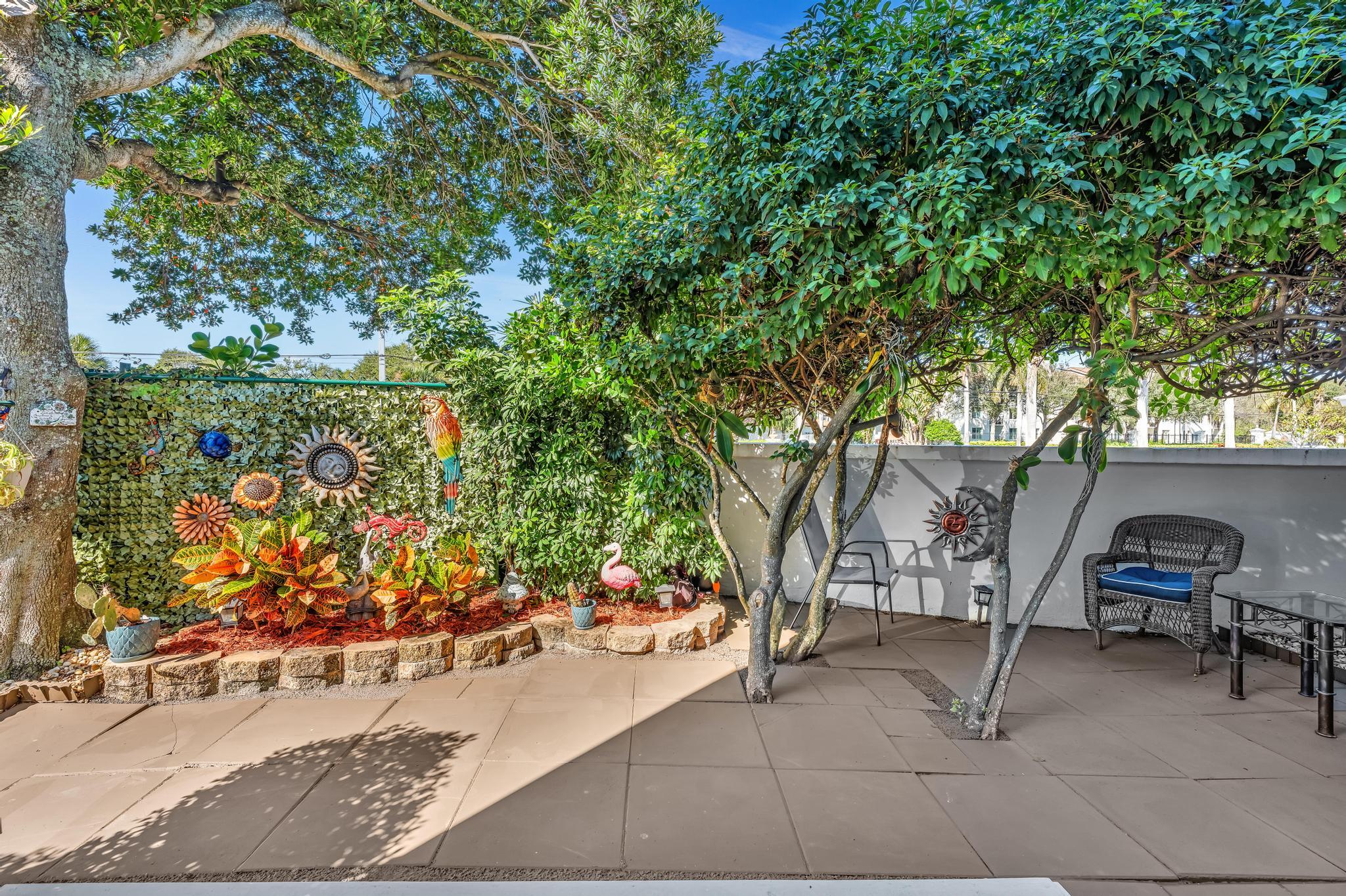 34 Colonial Club Drive, Unit 101 Boynton Beach, FL 33435 - Photo 26 of 58 a view of outdoor space and yard