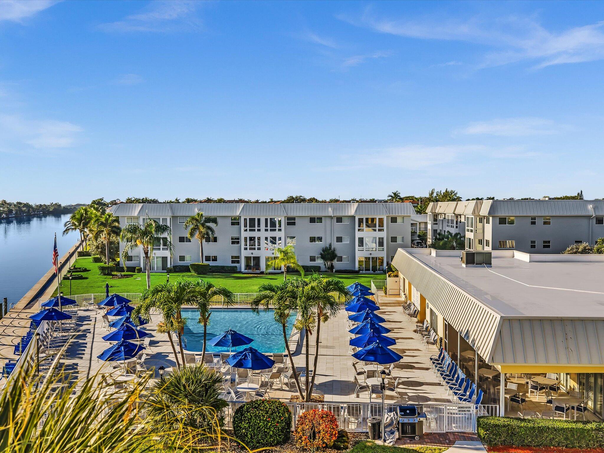 34 Colonial Club Drive, Unit 101 Boynton Beach, FL 33435 - Photo 57 of 58 a view of building and outdoor space