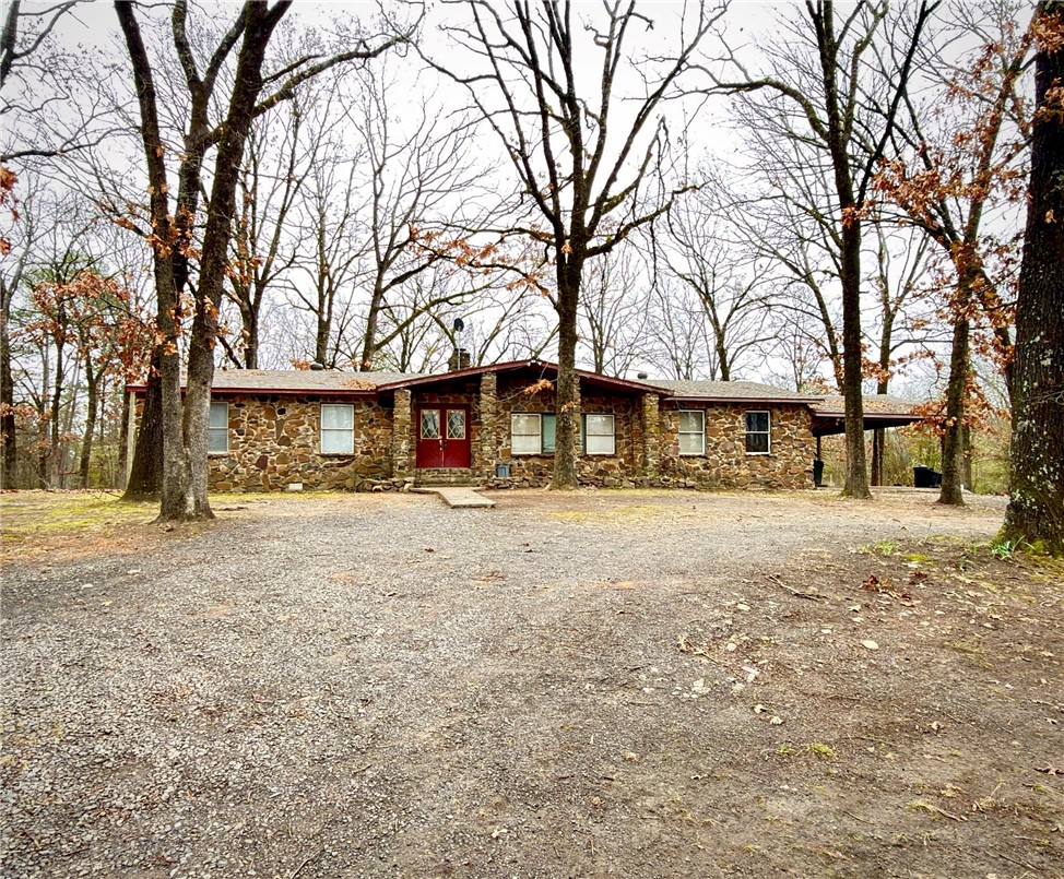 840 Miller Road Ola, AR 72853 - Photo 1 of 23 Single story home with stone siding, driveway, and a chimney