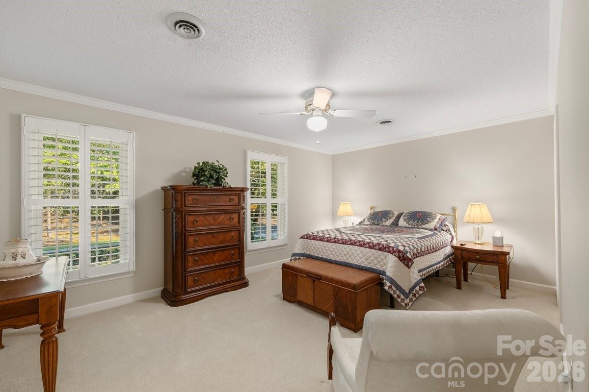 207 Lost Corner Road Morganton, NC 28655 - Photo 42 of 46 a bedroom with furniture and a window