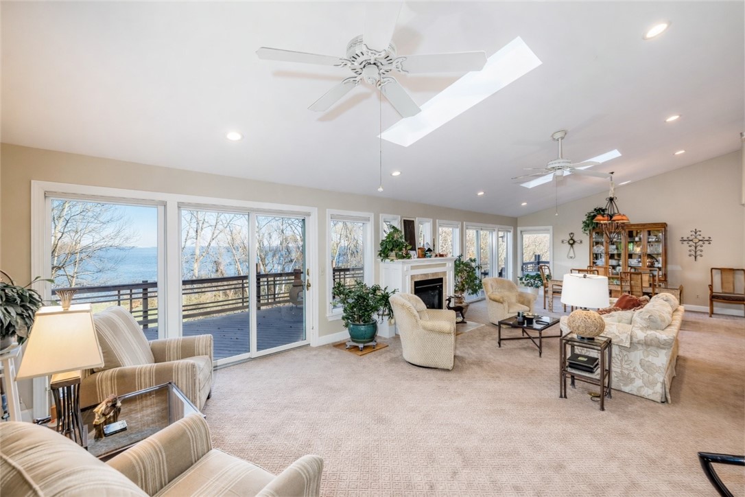 14789 Highview Road Carlton, NY 14477 - Photo 19 of 50 OPEN LIVING VAULTED CEILING GREAT ROOM WITH WALL O