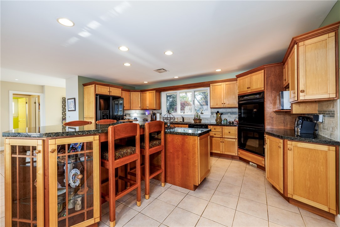 14789 Highview Road Carlton, NY 14477 - Photo 25 of 50 DESIGNER COOK'S KITCHEN WITH BEAUTIFUL CABINETRY