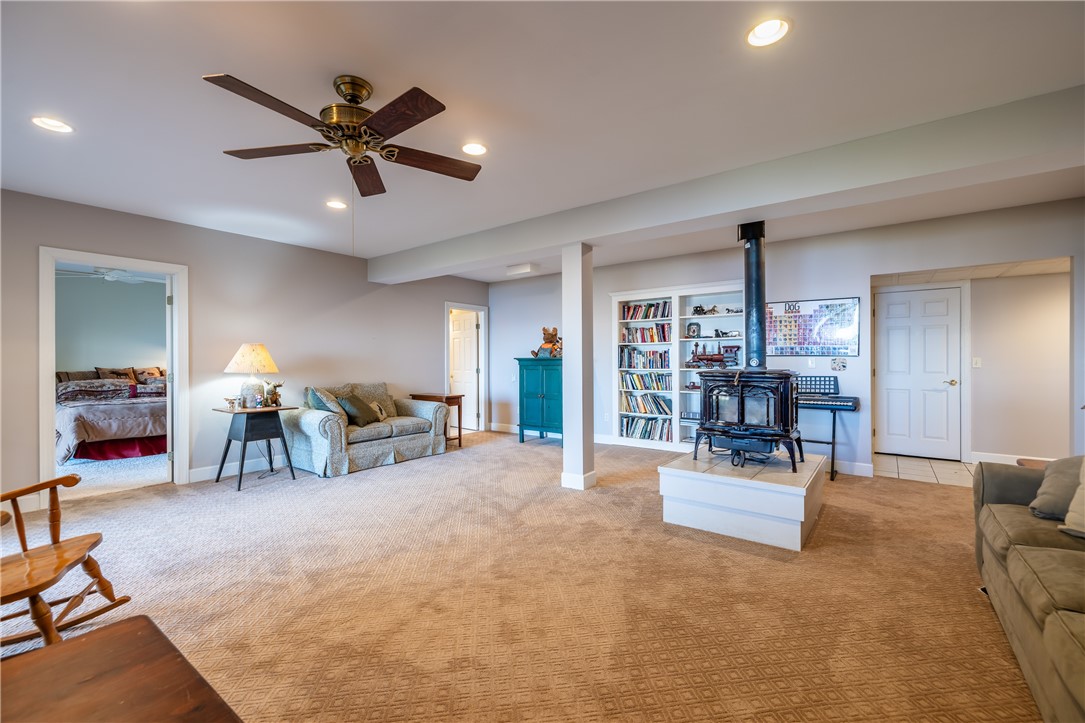 14789 Highview Road Carlton, NY 14477 - Photo 39 of 50 SPACIOUS LOWER LEVEL ACTIVITY ROOM WITH LAKE VIEWS