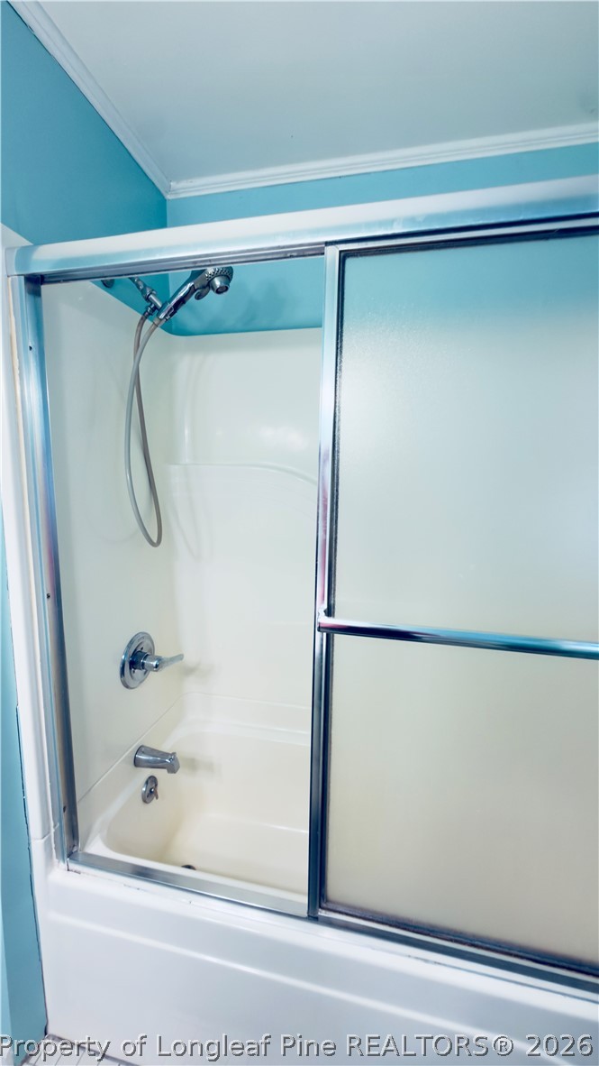 5309 Tobacco Road Orrum, NC 28369 - Photo 22 of 44 a bathroom with a shower and a bath tub