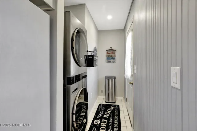 a view of a hallway with washer and dryer