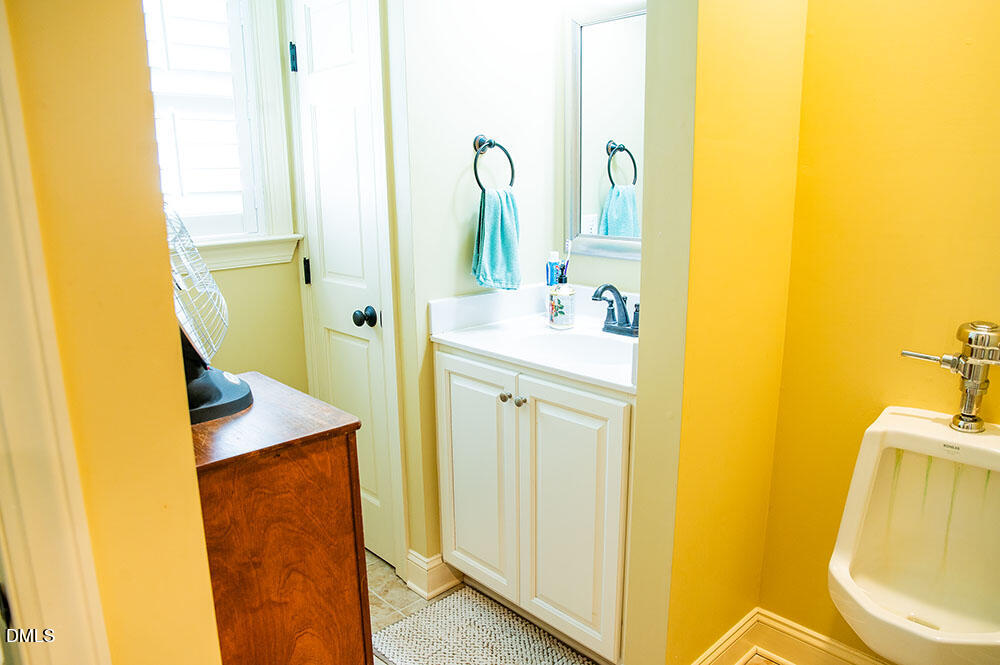 75 Frank Timberlake Road Timberlake, NC 27583 - Photo 40 of 93 a bathroom with a sink and a mirror