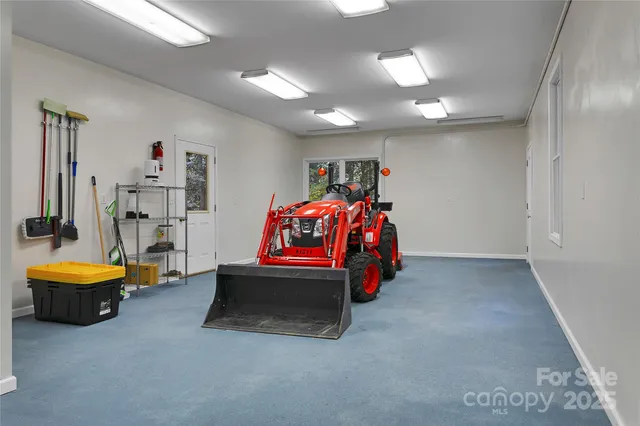 a bedroom with bed and window