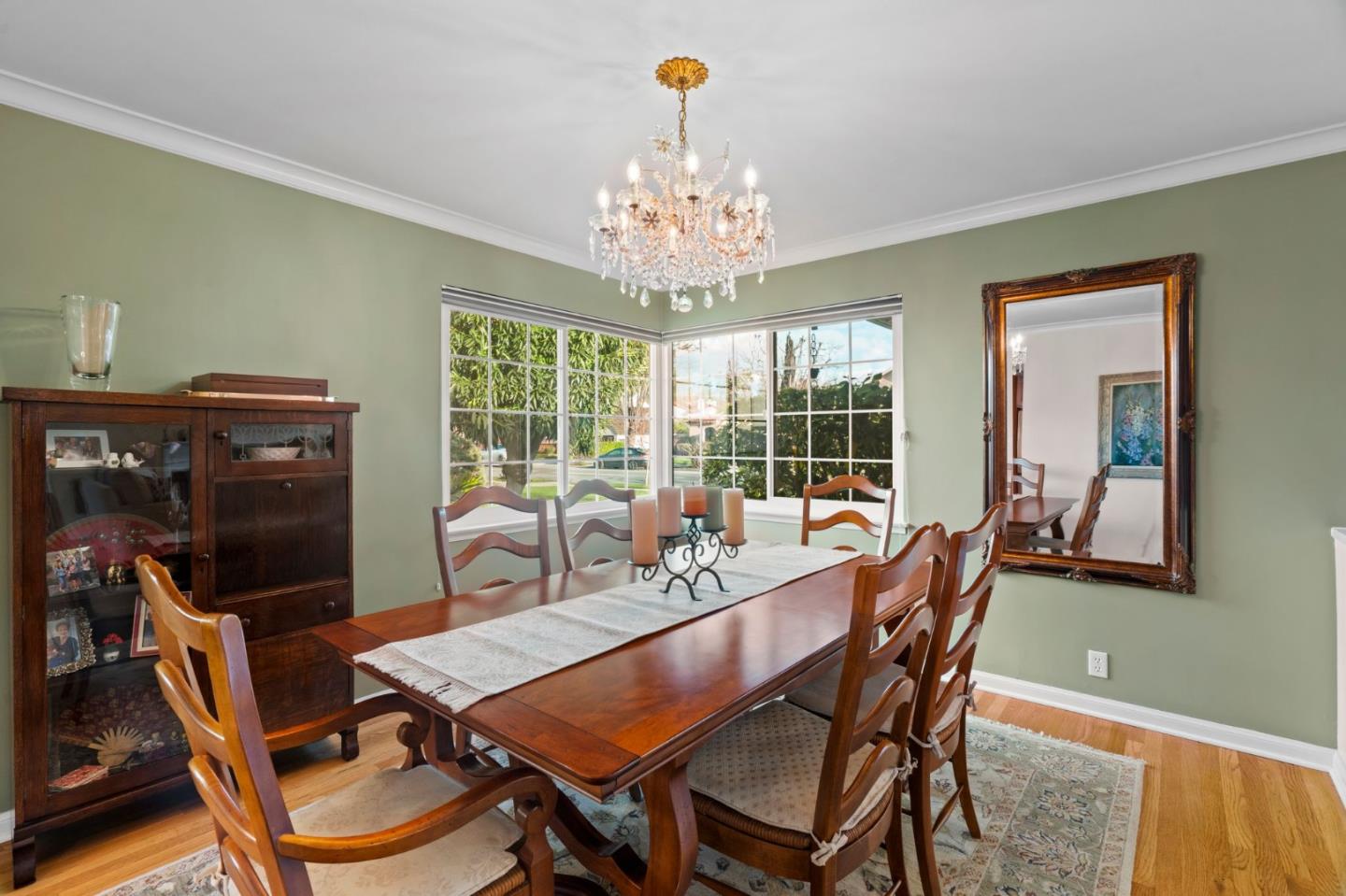1765 Emory Street San Jose, CA 95126 - Photo 11 of 46 a dining room with furniture a chandelier and window