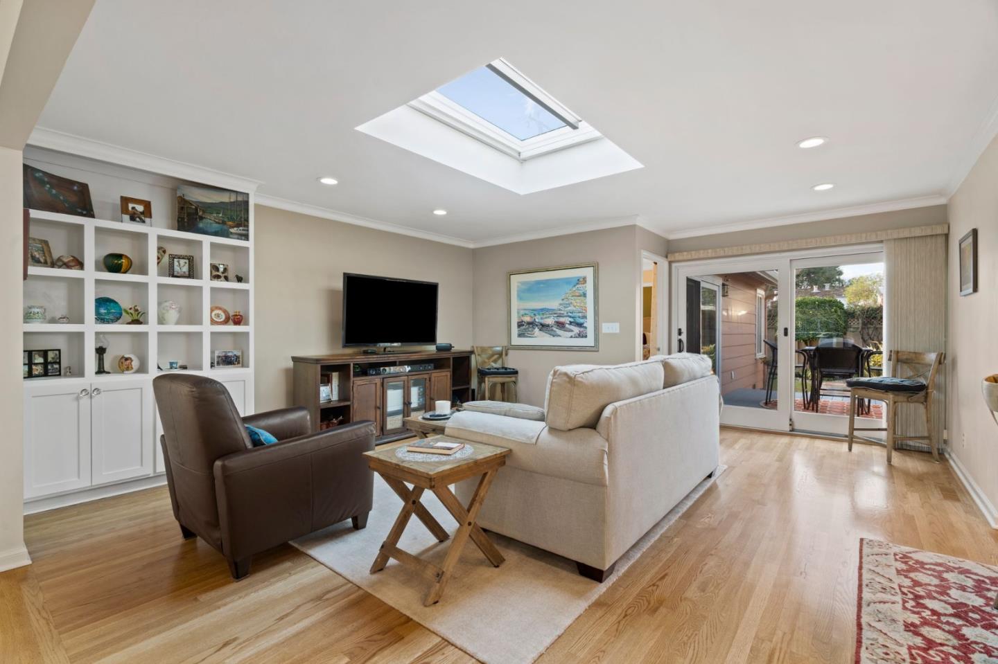 1765 Emory Street San Jose, CA 95126 - Photo 14 of 46 a living room with furniture a flat screen tv and a rug