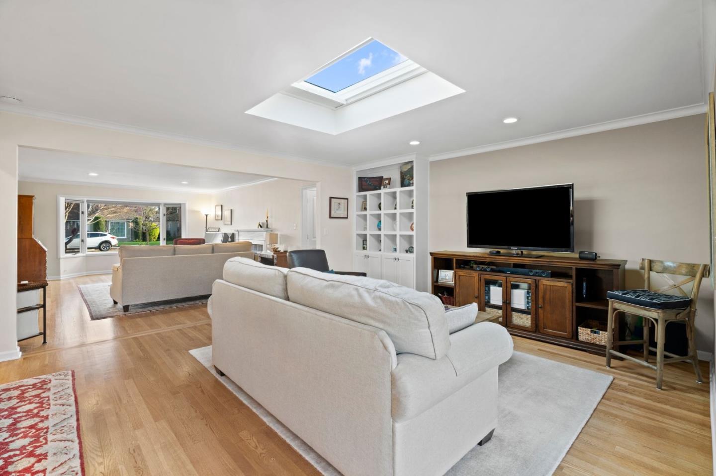 1765 Emory Street San Jose, CA 95126 - Photo 15 of 46 a living room with furniture and a flat screen tv