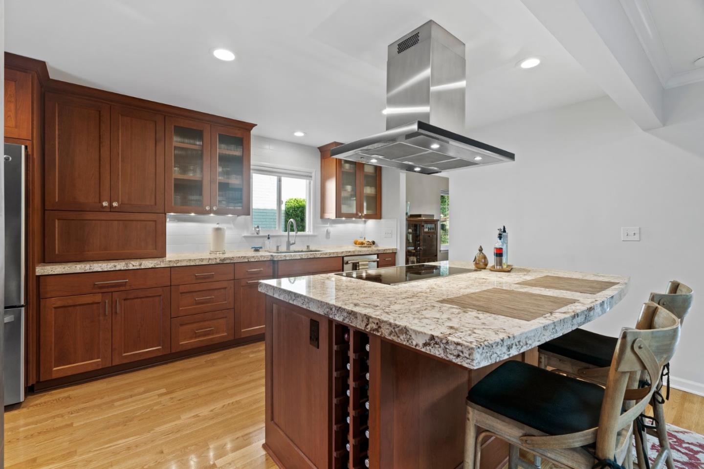 1765 Emory Street San Jose, CA 95126 - Photo 22 of 46 a kitchen with a table and chairs in it