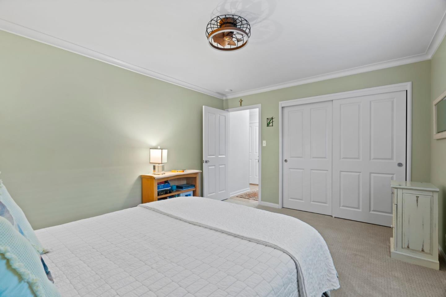 1765 Emory Street San Jose, CA 95126 - Photo 25 of 46 a bedroom with a bed and a mirror