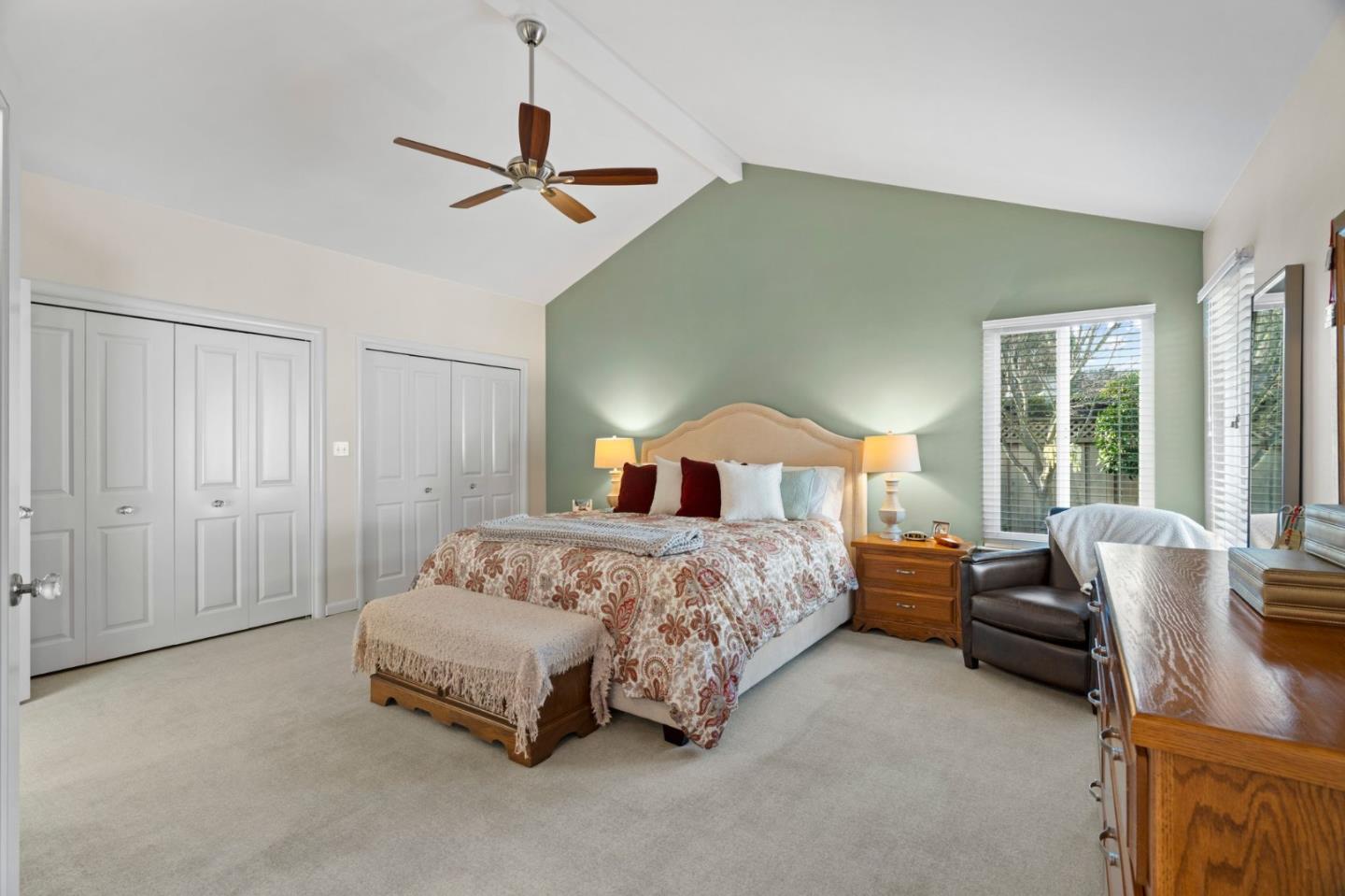 1765 Emory Street San Jose, CA 95126 - Photo 29 of 46 a bedroom with a bed chair and window