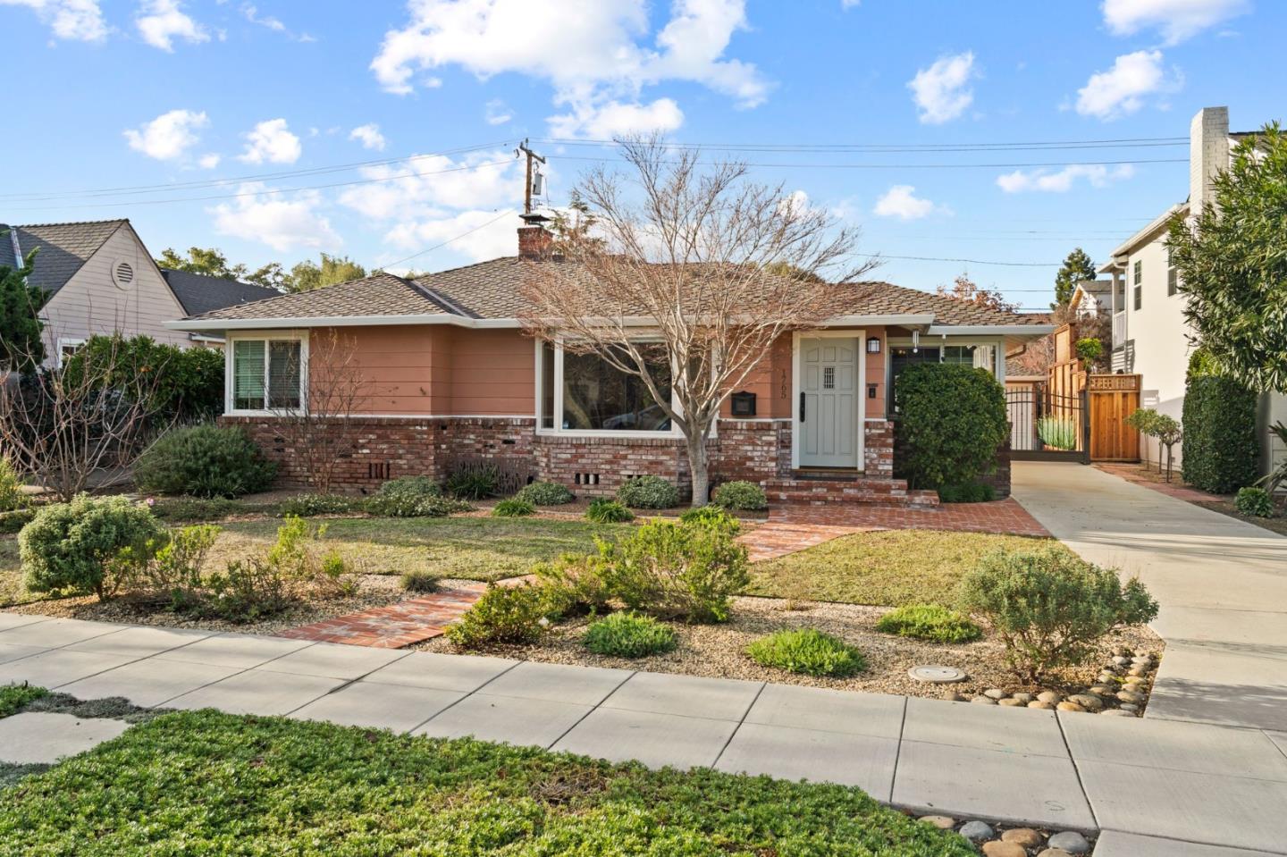 1765 Emory Street San Jose, CA 95126 - Photo 3 of 46 a front view of a house with garden