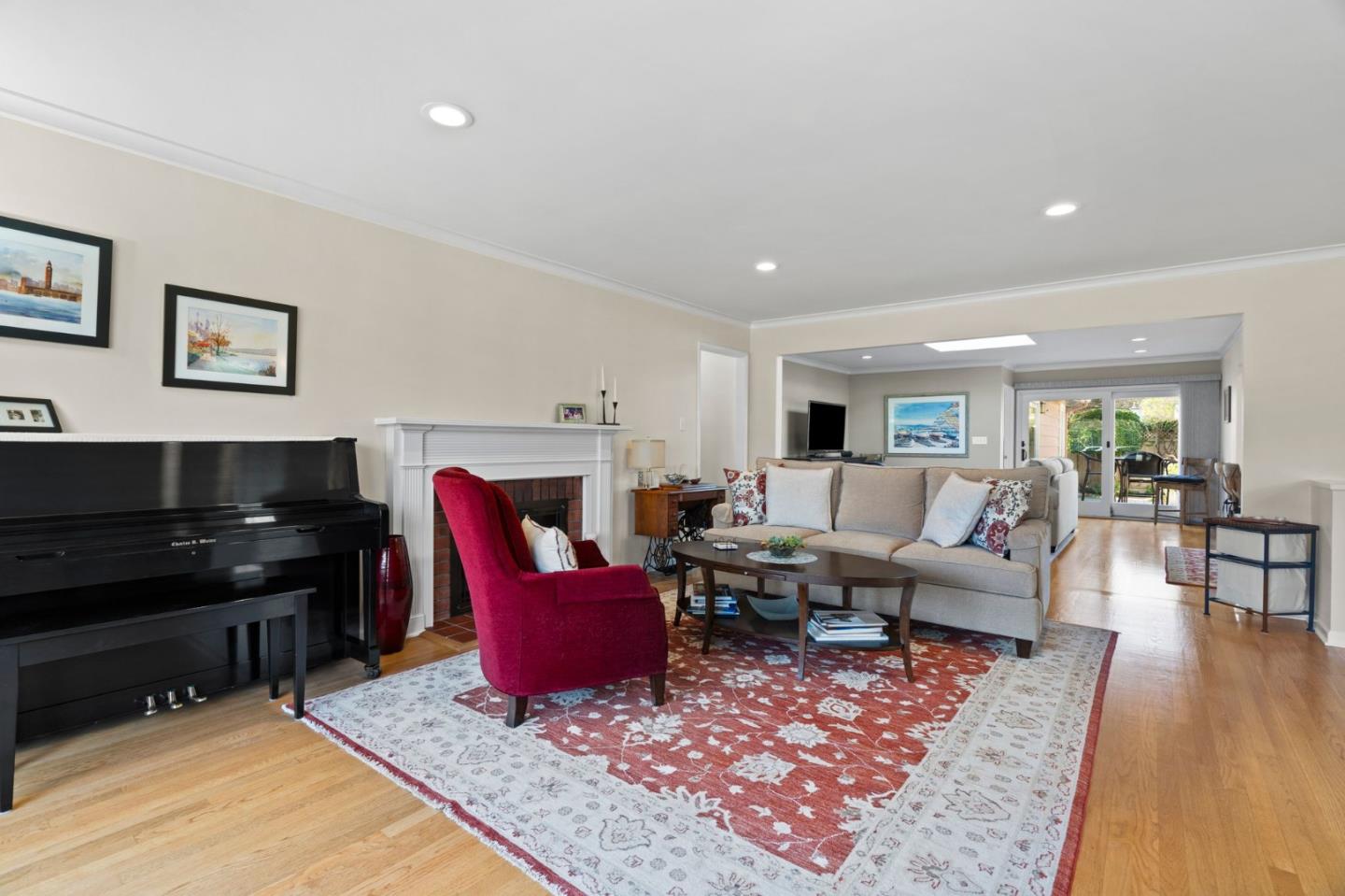 1765 Emory Street San Jose, CA 95126 - Photo 6 of 46 a living room with furniture and a piano