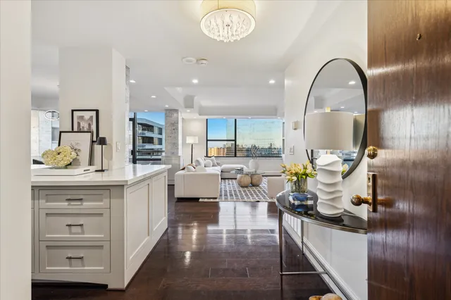 a kitchen with a table and chairs
