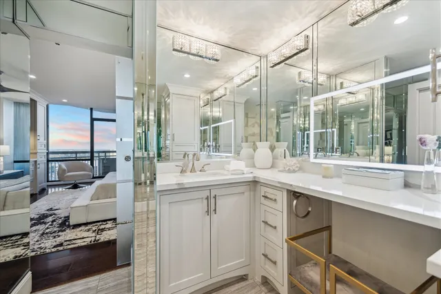 a large white bed in a white room