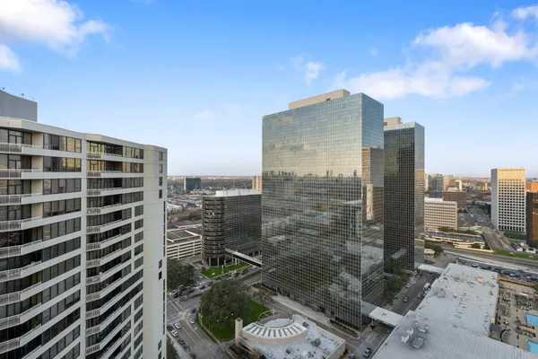 a view of a city with tall buildings