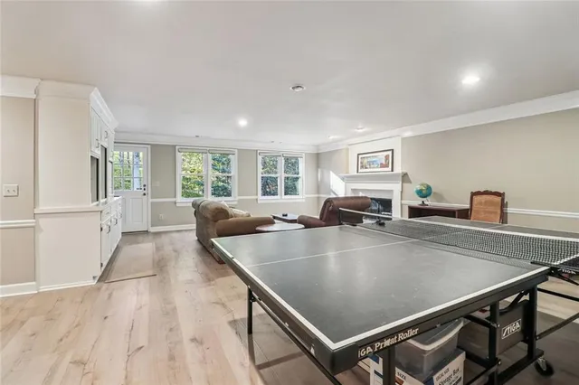 a view of kitchen and dining room with wooden floor