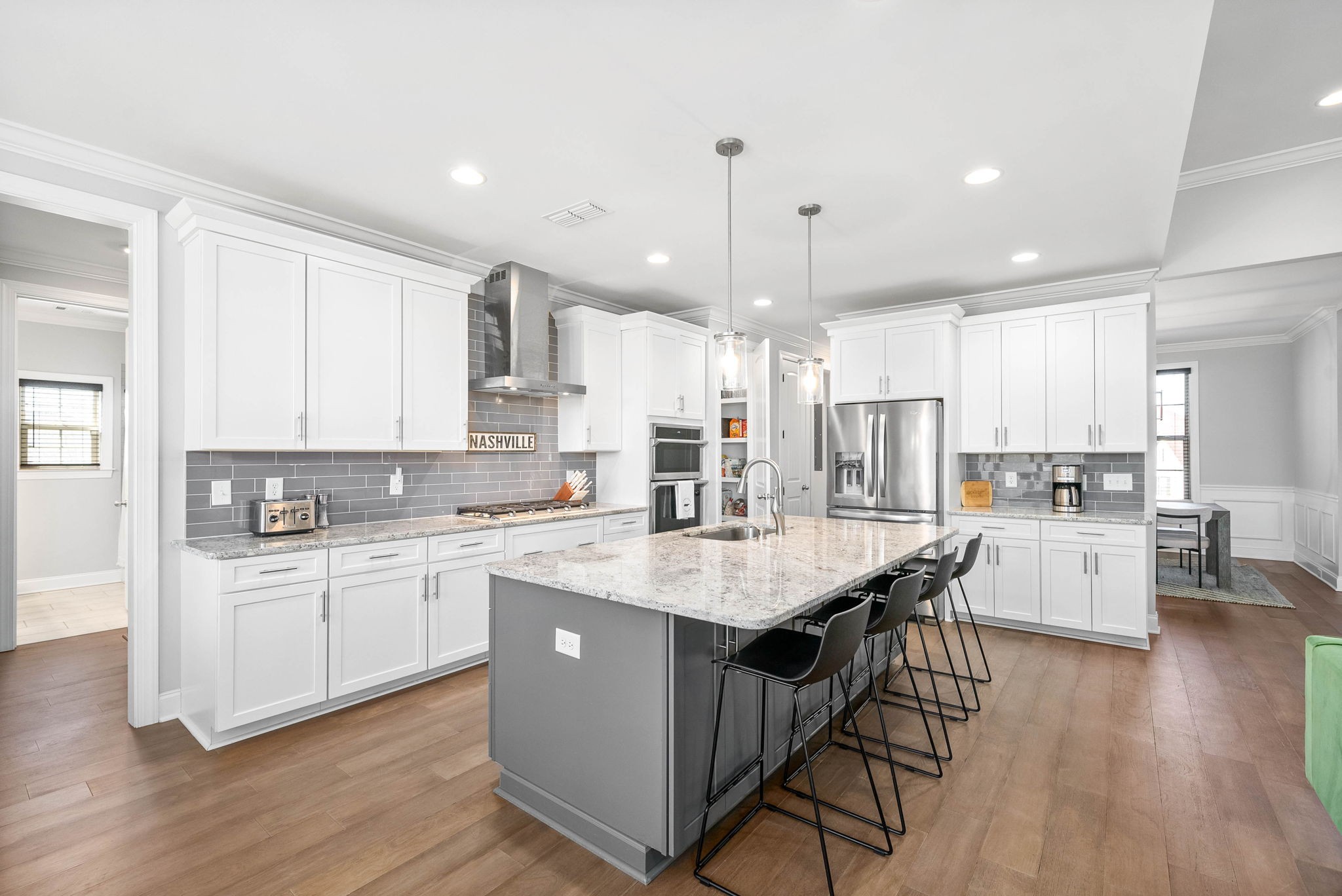 2022 Eagle View Road Hendersonville, TN 37075 - Photo 14 of 50 a large kitchen with stainless steel appliances kitchen island granite countertop a large center island attached withe living room