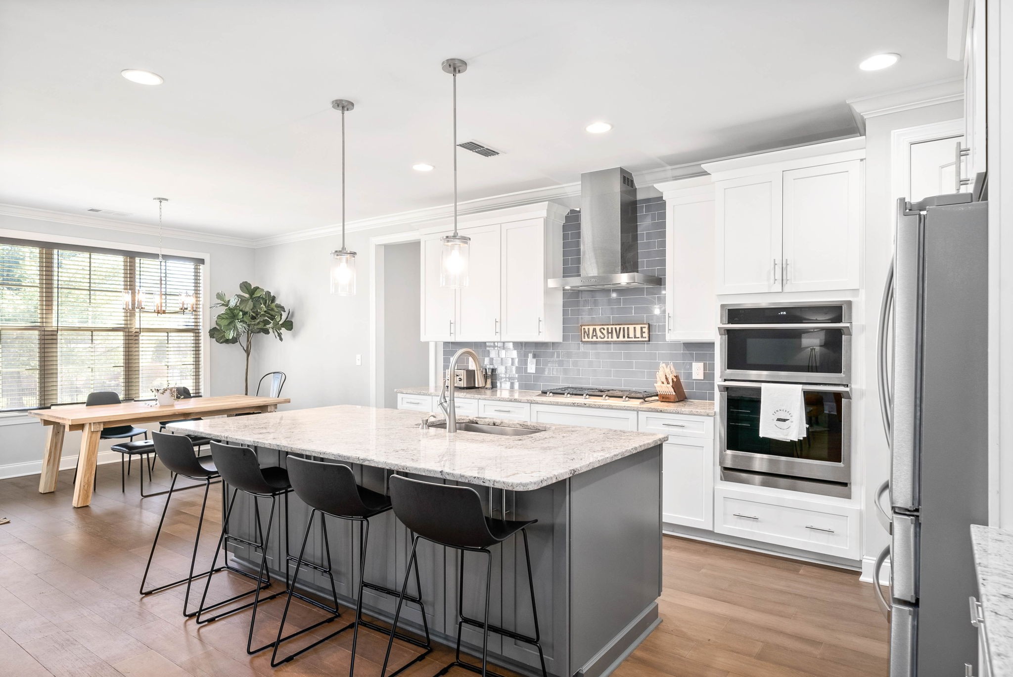 2022 Eagle View Road Hendersonville, TN 37075 - Photo 15 of 50 a kitchen with stainless steel appliances granite countertop a stove a refrigerator a kitchen island a sink and a refrigerator