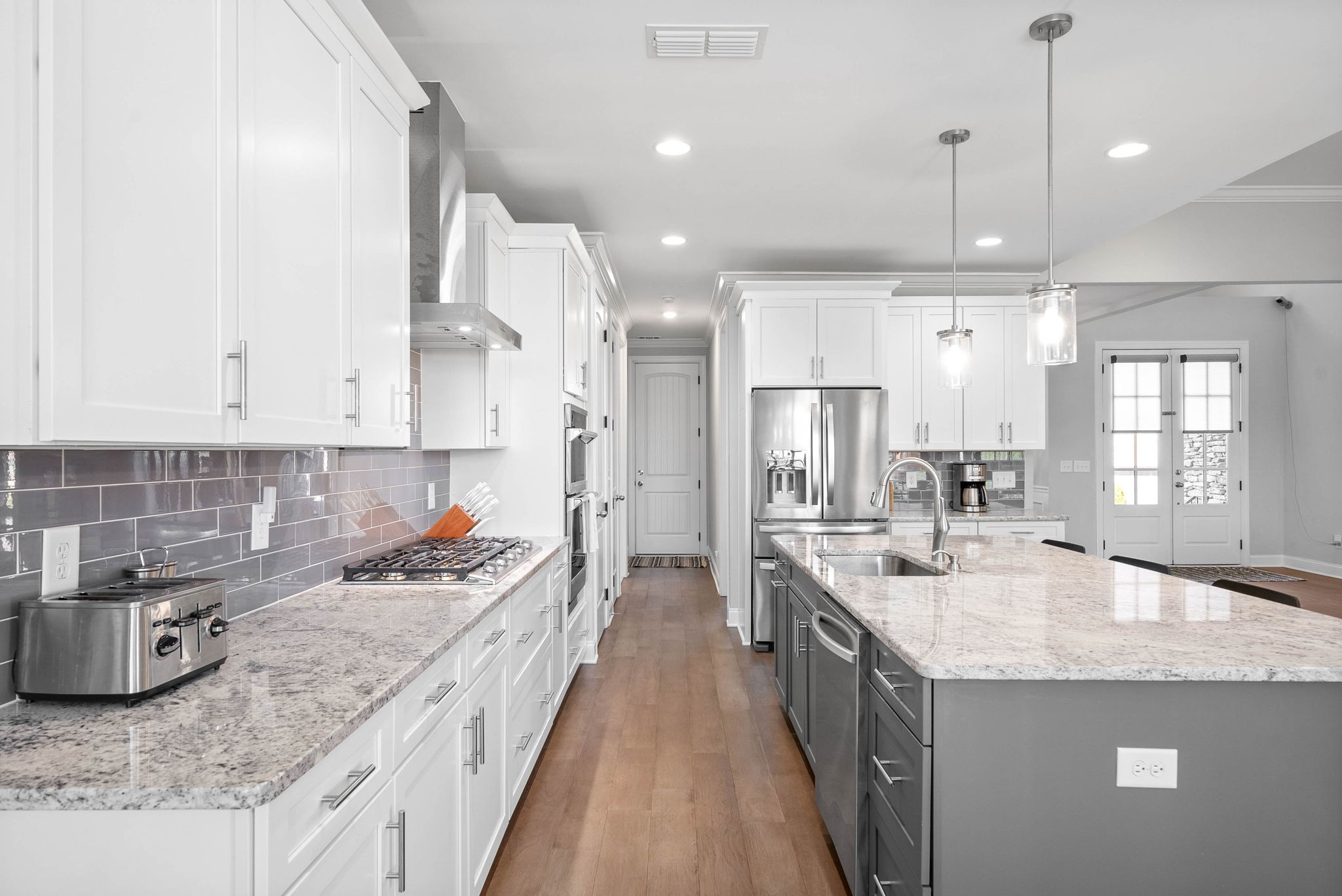 2022 Eagle View Road Hendersonville, TN 37075 - Photo 16 of 50 a kitchen with stainless steel appliances granite countertop a sink stove and cabinets