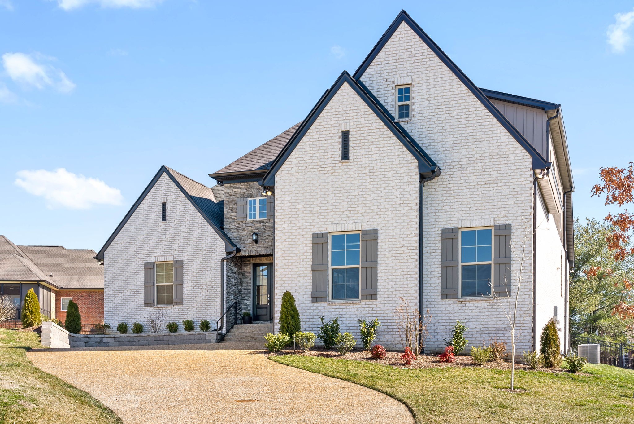 2022 Eagle View Road Hendersonville, TN 37075 - Photo 2 of 50 a front view of a house with garden