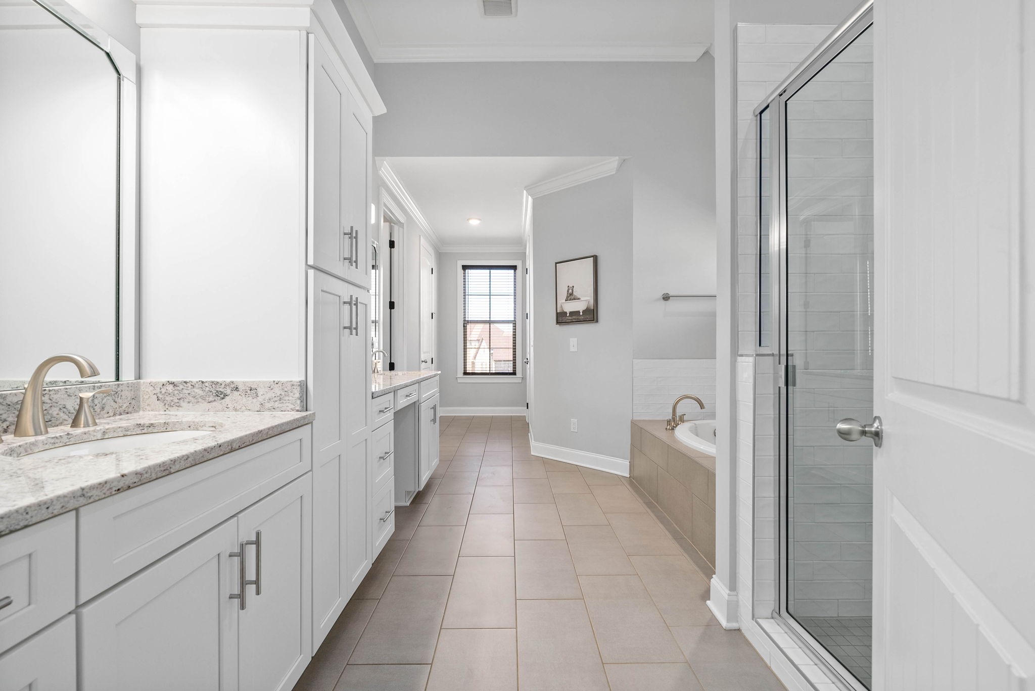 2022 Eagle View Road Hendersonville, TN 37075 - Photo 22 of 50 a spacious bathroom with a granite countertop sink a mirror and a shower