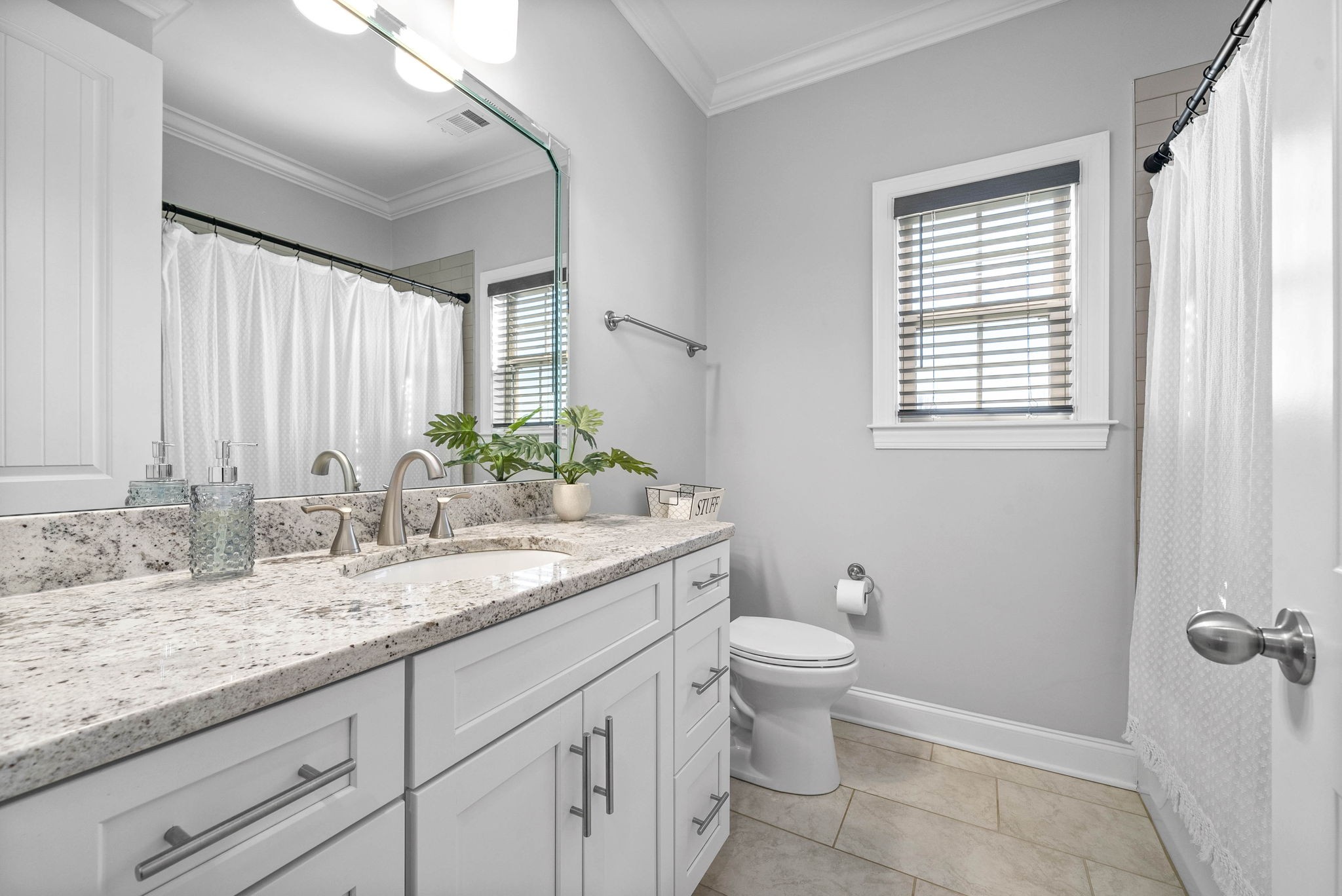 2022 Eagle View Road Hendersonville, TN 37075 - Photo 28 of 50 a bathroom with a granite countertop sink toilet and mirror