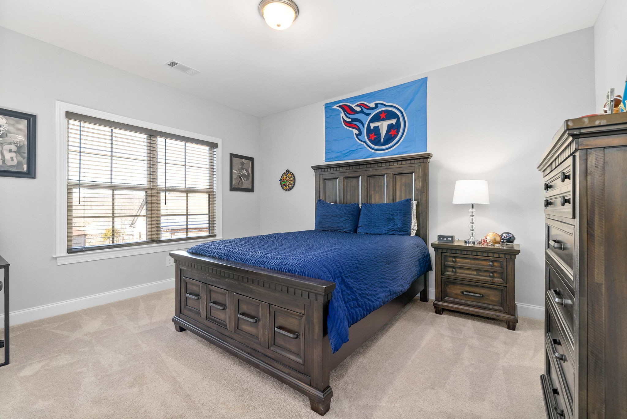 2022 Eagle View Road Hendersonville, TN 37075 - Photo 29 of 50 a bedroom with a bed and a refrigerator