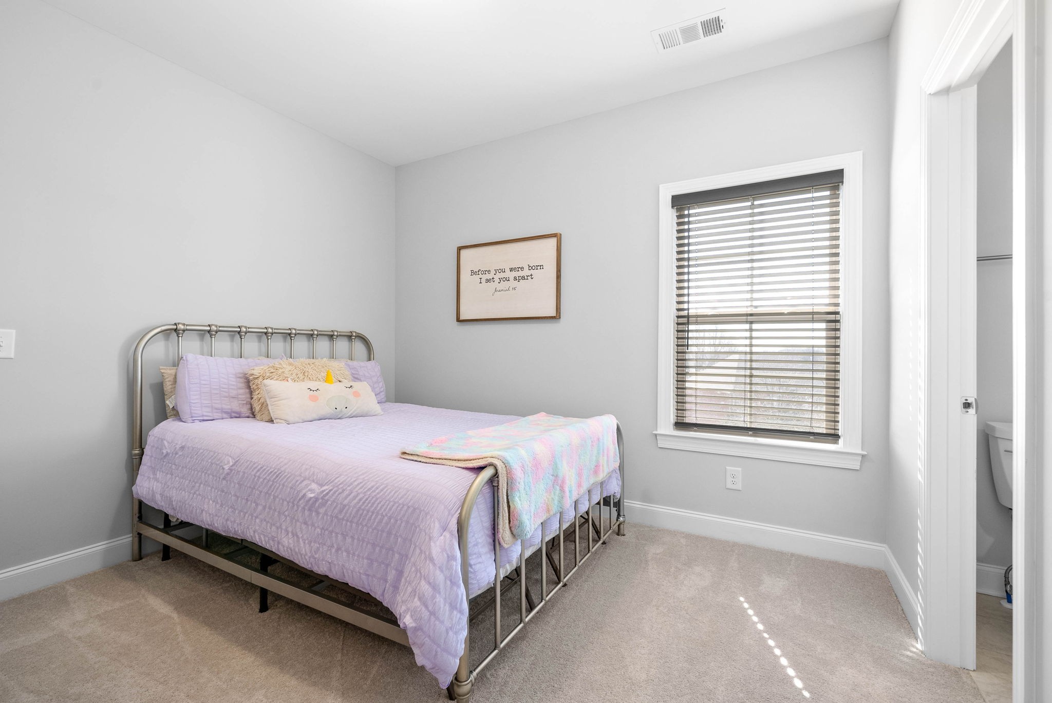 2022 Eagle View Road Hendersonville, TN 37075 - Photo 30 of 50 a bedroom with a bed and window