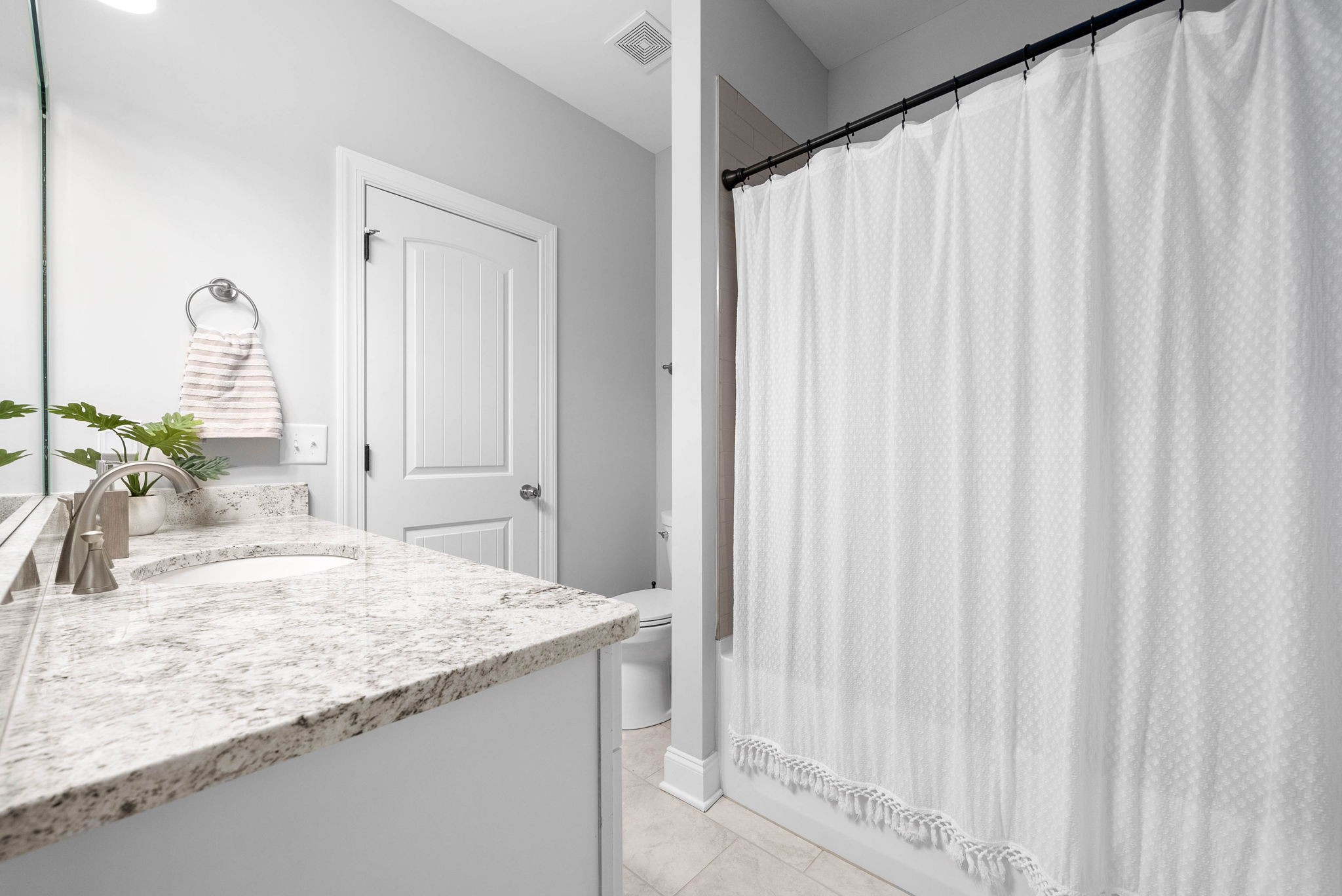 2022 Eagle View Road Hendersonville, TN 37075 - Photo 31 of 50 a bathroom with a granite countertop sink and a mirror
