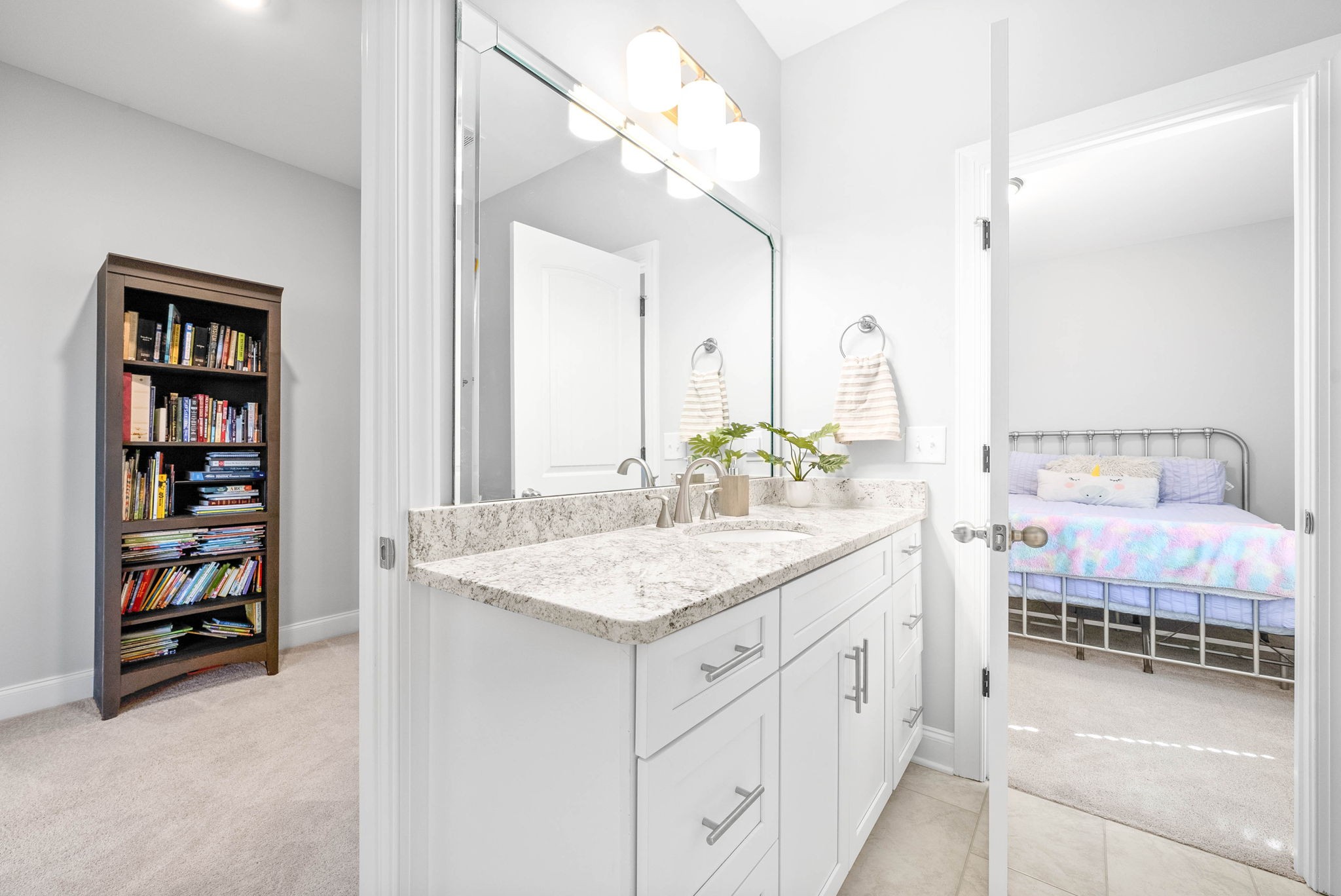 2022 Eagle View Road Hendersonville, TN 37075 - Photo 32 of 50 a en suite bathroom with a granite countertop sink and a mirror