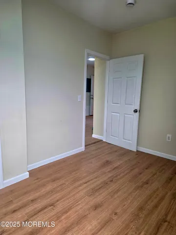a bathroom with a shower and a tub