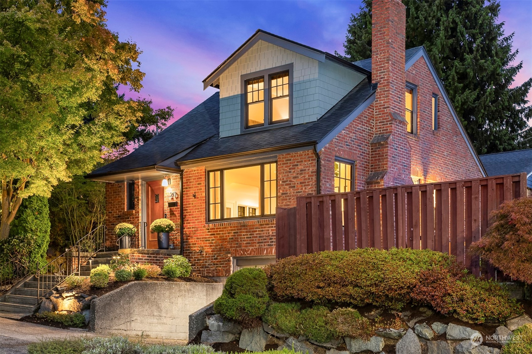 20 Armour Street Seattle, WA 98109 - Photo 1 of 34 a front view of a house with garden