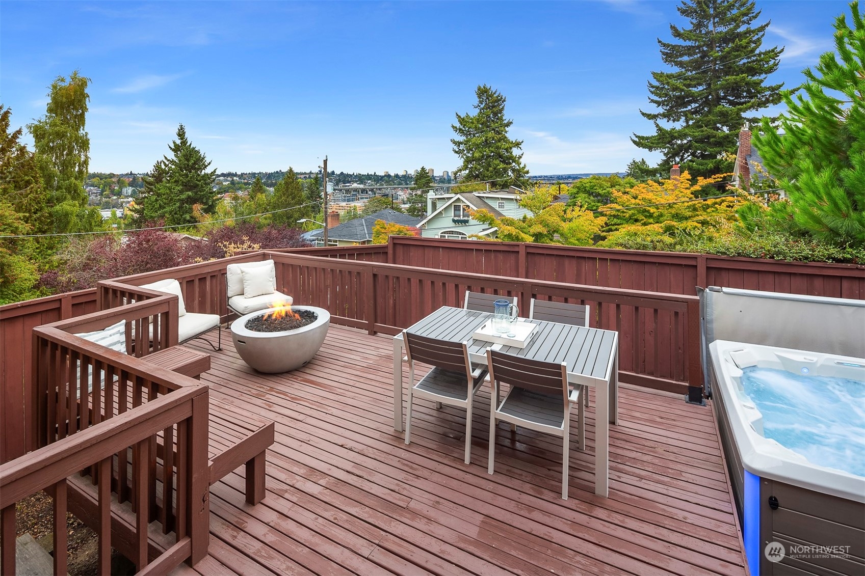 20 Armour Street Seattle, WA 98109 - Photo 14 of 34 a view of a balcony with two chairs and wooden floor