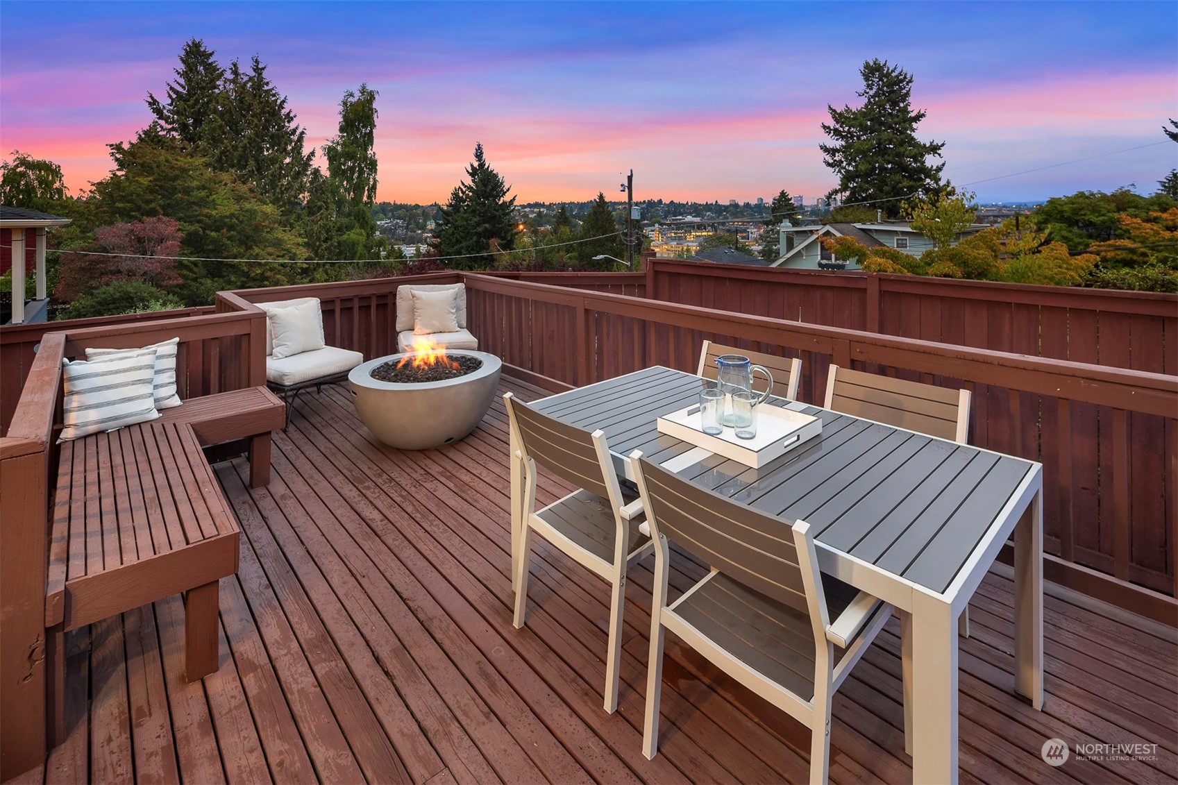 20 Armour Street Seattle, WA 98109 - Photo 15 of 34 a view of a balcony with wooden floor and outdoor seating