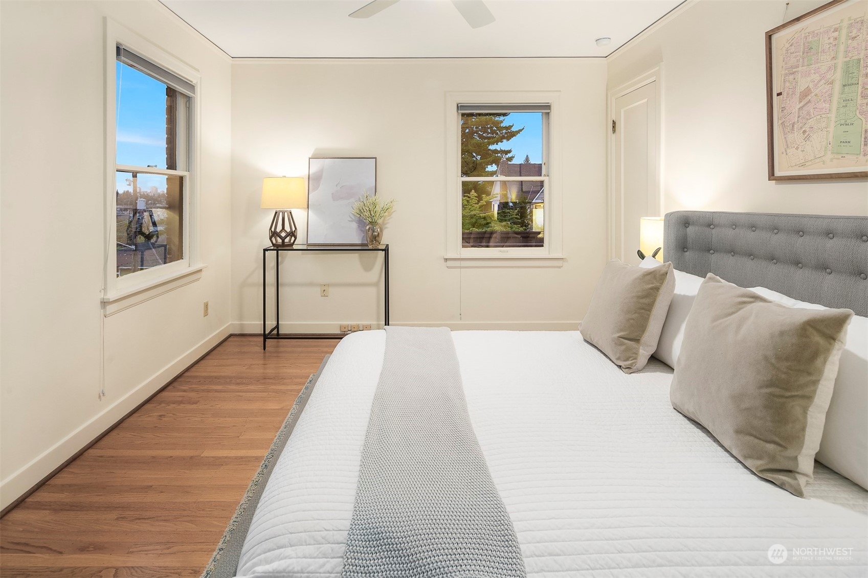 20 Armour Street Seattle, WA 98109 - Photo 22 of 34 a bedroom with a bed and painting on the wall