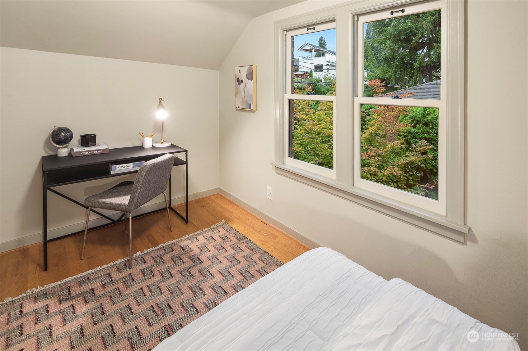 20 Armour Street Seattle, WA 98109 - Photo 27 of 34 a bedroom with a bed and a window
