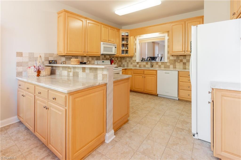 3860 Waterview Road High Point, NC 27265 - Photo 12 of 30 Kitchen with new Tile Backsplash and Granite Counter Tops. Lots of counter space and storage.