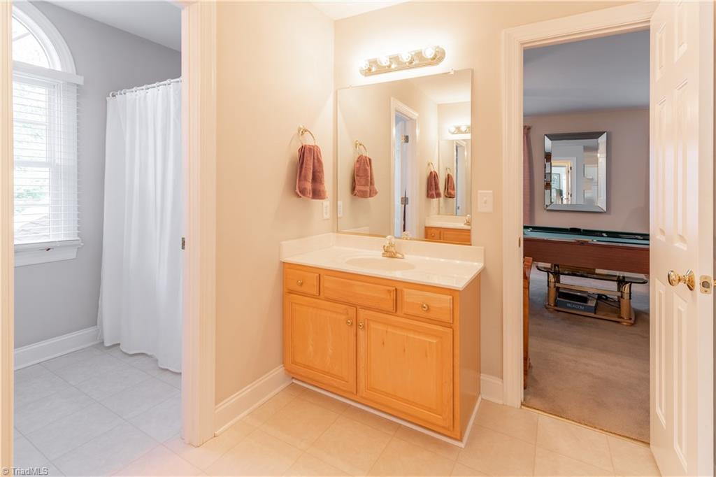 3860 Waterview Road High Point, NC 27265 - Photo 23 of 30 Upper Level Full Bath attached to the Bonus Room with two separate Sinks