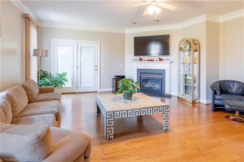 3860 Waterview Road High Point, NC 27265 - Photo 8 of 30 Large Living Room with beautiful wood floors and Gas Log Fireplace.
