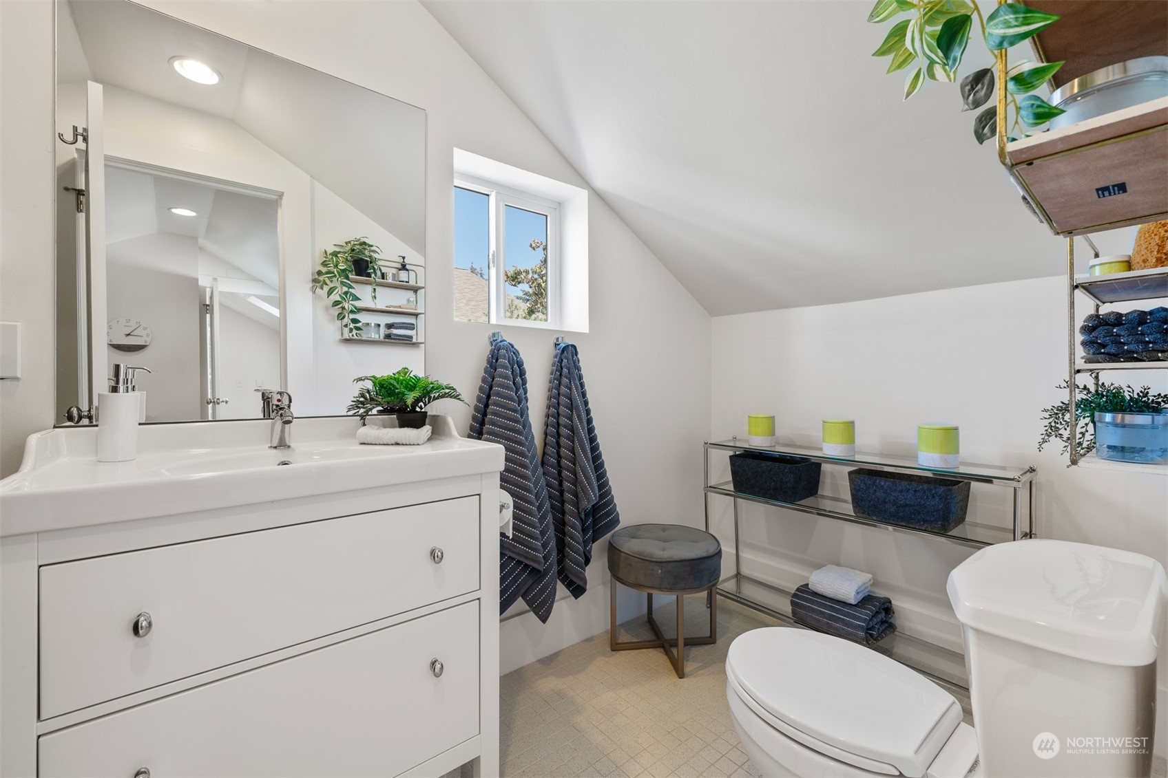 2506 Walnut Avenue Southwest Seattle, WA 98116 - Photo 17 of 29 a bathroom with a toilet sink and mirror