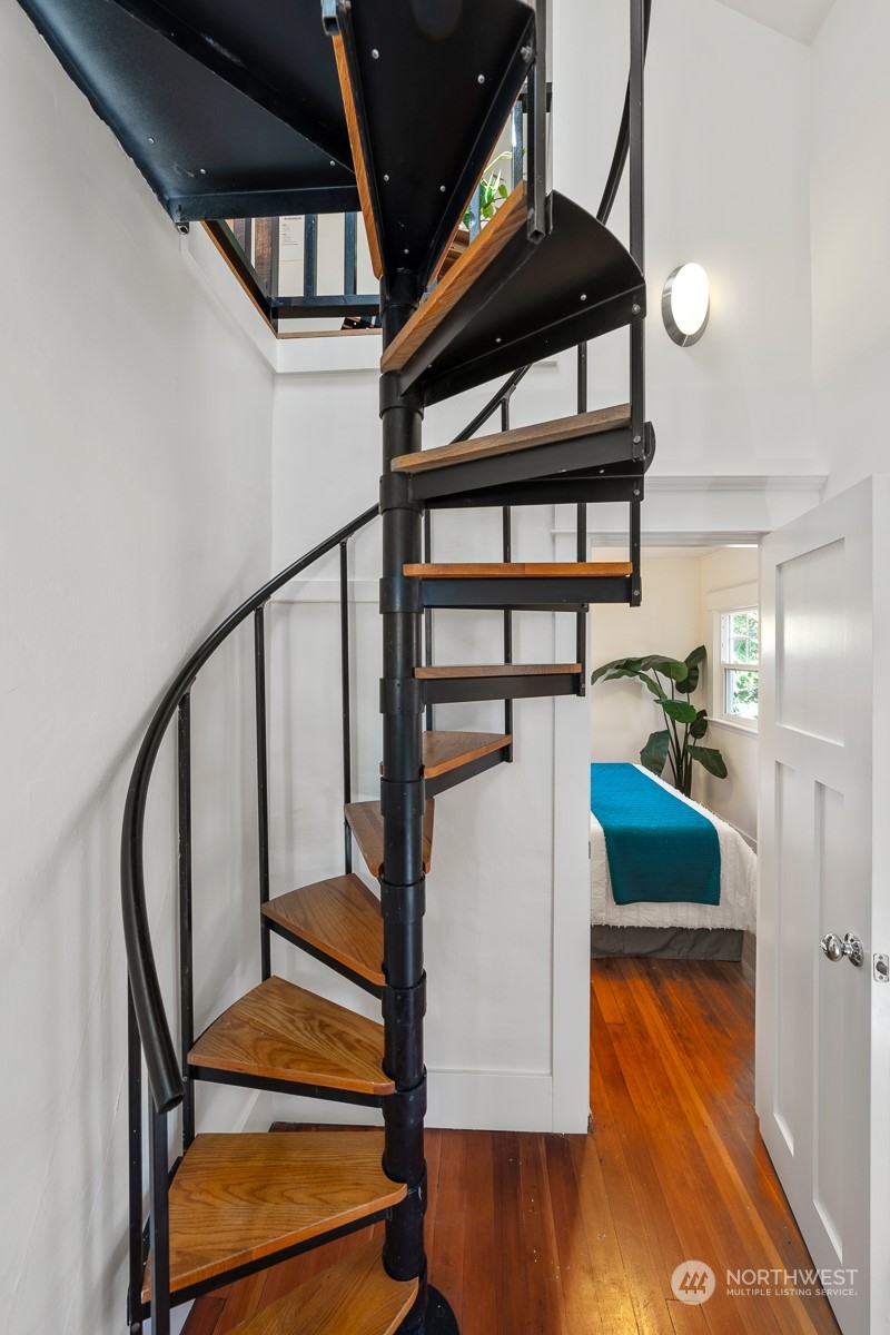 2506 Walnut Avenue Southwest Seattle, WA 98116 - Photo 21 of 29 a view of entryway with wooden floor and a rug