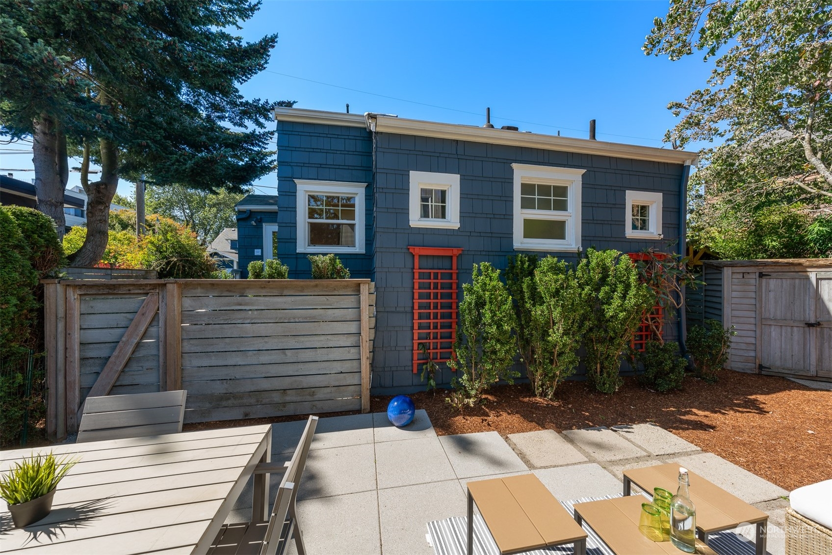 2506 Walnut Avenue Southwest Seattle, WA 98116 - Photo 29 of 29 a front view of a house with a garden