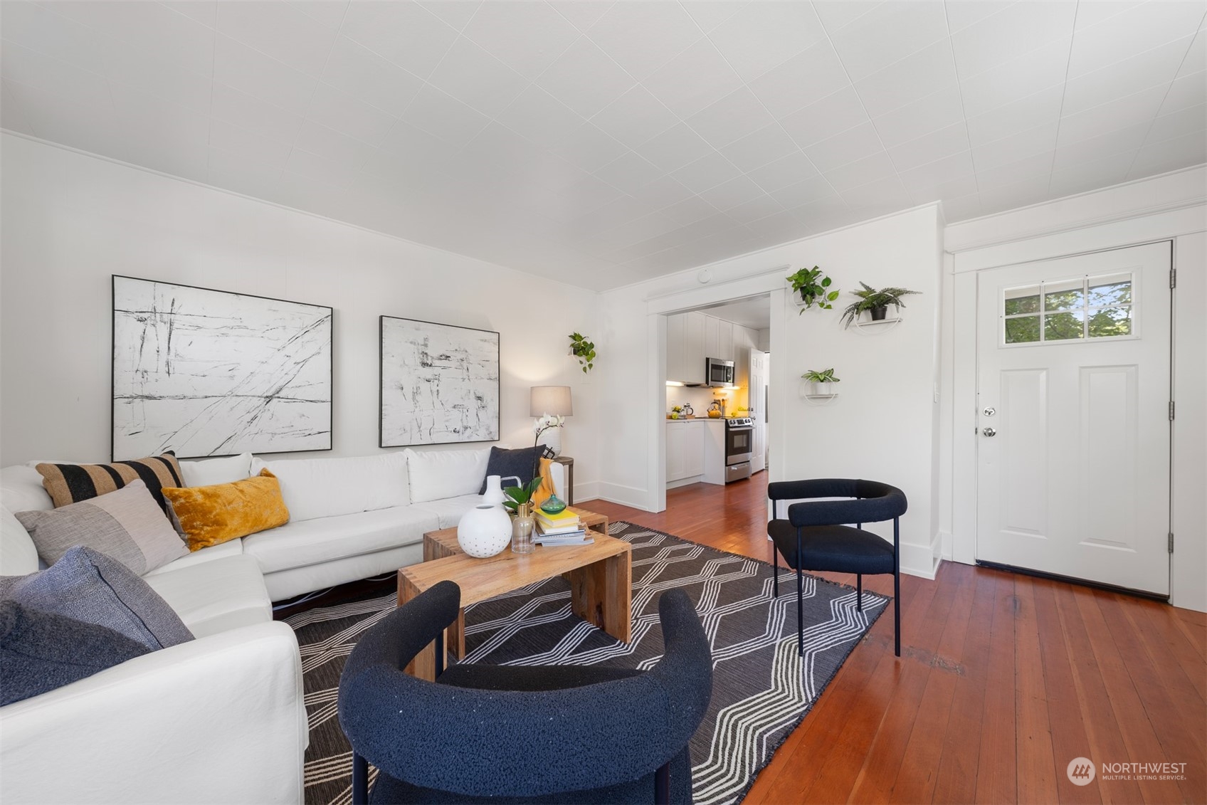 2506 Walnut Avenue Southwest Seattle, WA 98116 - Photo 5 of 29 a living room with furniture and wooden floor