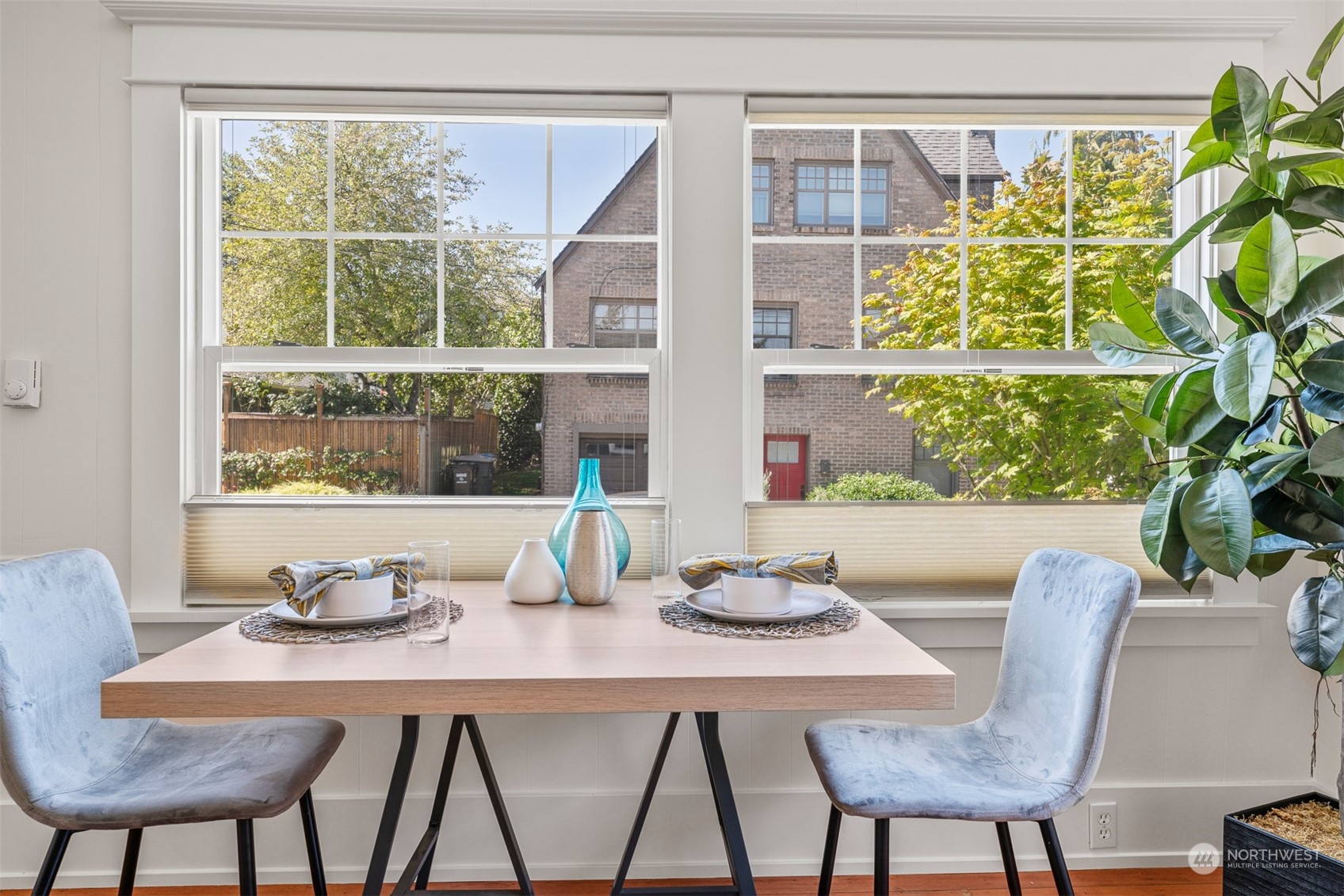 2506 Walnut Avenue Southwest Seattle, WA 98116 - Photo 6 of 29 a dining room with furniture and window